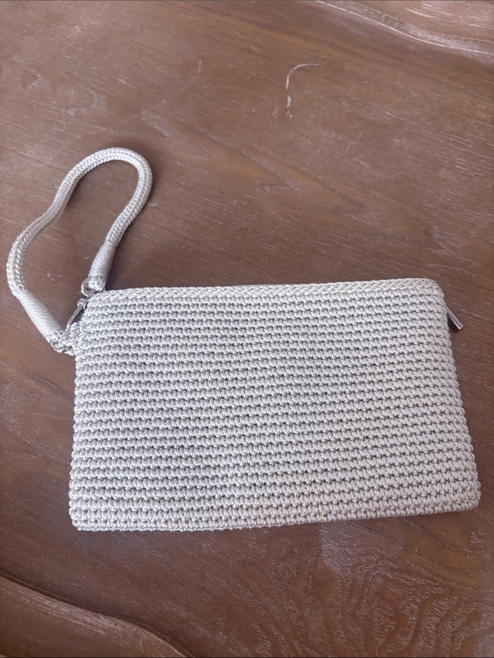 The Sak Cream Silver Woven Wristlet Clutch